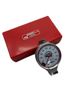 Dial indicator with red case on a white background