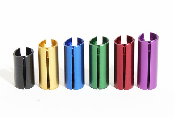 Front View of a Black, Gold, Blue, Green, Red, and Purple LO206 Slide Restrictors Next to Each Other.