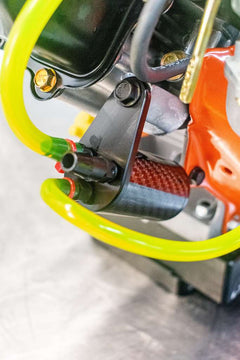 Black Carbon Fiber Lightweight Catch Can on the Back of a Lawson Speed Shop LO206 Motor.